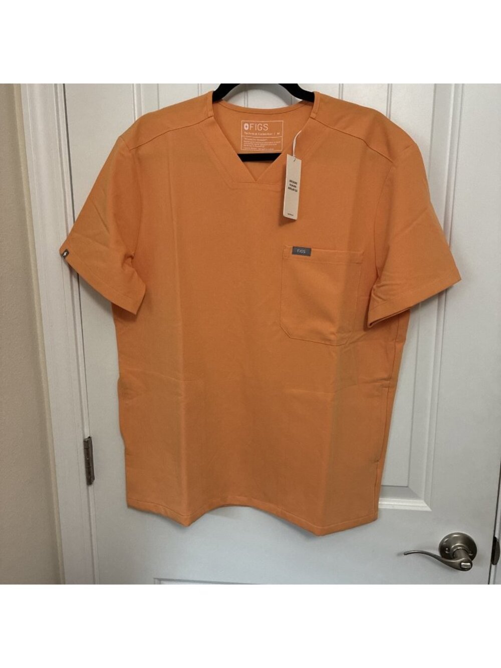 Figs CHISEC Three Pocket Scrub Top In Light Orange Size Medium